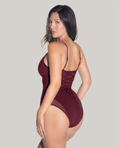 Model is in Meshy Low-Cut One Piece with Built-in Shapewear - Dark Cherry side view