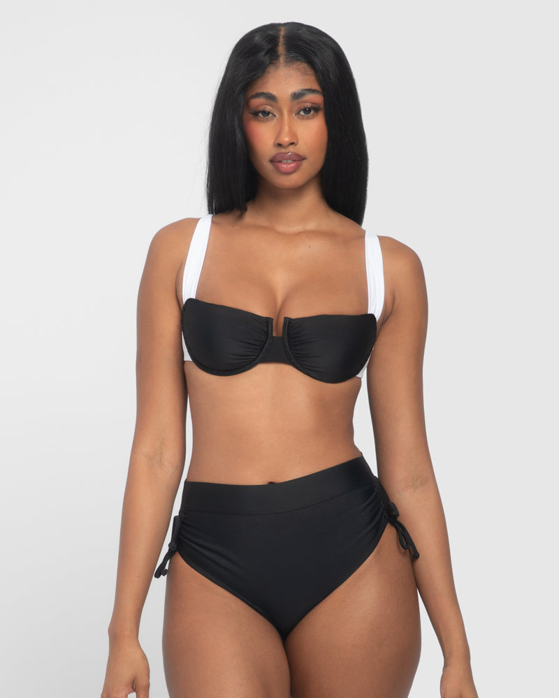 Model is wearing Sweetie Bikini Tie Back Underwire Top - Black/White with a matching bottom