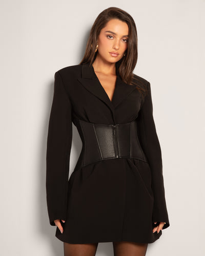 Model wears Corset Belt - Faux Leather Black front view