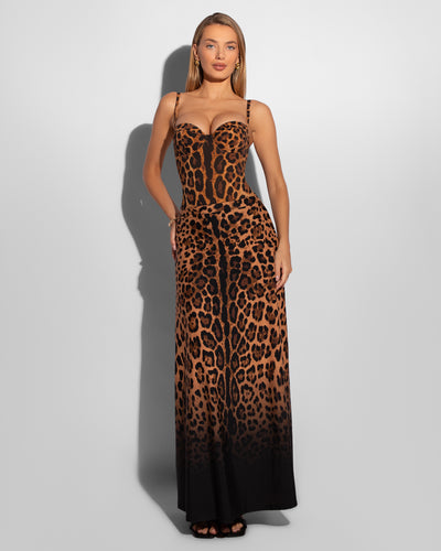 Model wears A-Line Maxi Skirty Pull On Swim Cover Up - Ombre Symmetric Leopard and bombshell one piece in a matching print