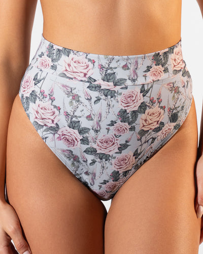 Close up image of Hi Cut Adjustable Kini Bottom - Blue Thorny Rose on model