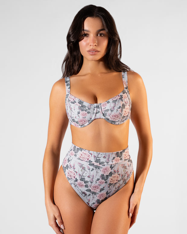 Front view of model wearing Lifty Tie Back Bikini Top - Blue Thorny Rose paired with Hi Cut Adjustable Kini Bottom - Blue Thorny Rose