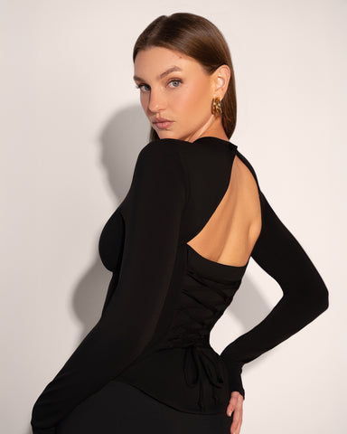 Model wears Shapey Crew Neck Long Sleeve Shapewear Top - Soft Sheen Jersey Black Side view