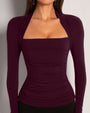 Zoomed in image of Shapey Ruched Long Sleeve Top - Garnet front view