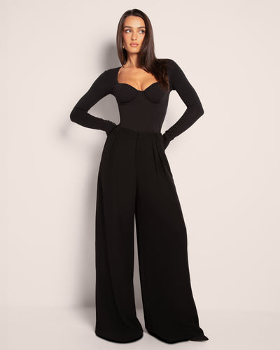 Model wears Sweetie Long Sleeve Sculpting Shapewear Top - Black with pants full font view