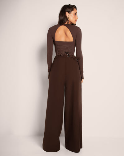 Model wears Pleaty Wide Leg Pleated Pant - Espresso with top full back view