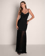 Model posing in Vixen Seamed Flare Maxi Dress - Black full body front view