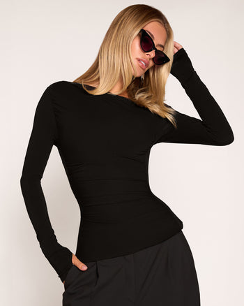 Close up of model in Shapey Bias Long Sleeve Top - Black front view 