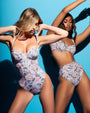 Model posing in Brazilian Bombshell - Blue Thorny Rose 
