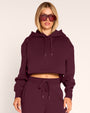 Model wearing Convertible Fleecey - Garnet at the cropped length