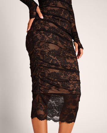 Close up of ruching detail on bottom half of Sweetie Long Sleeve Column Dress - Lace Black/Tawny