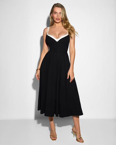 Model wearing Fit & Flare Midi Dress - Black/White front view