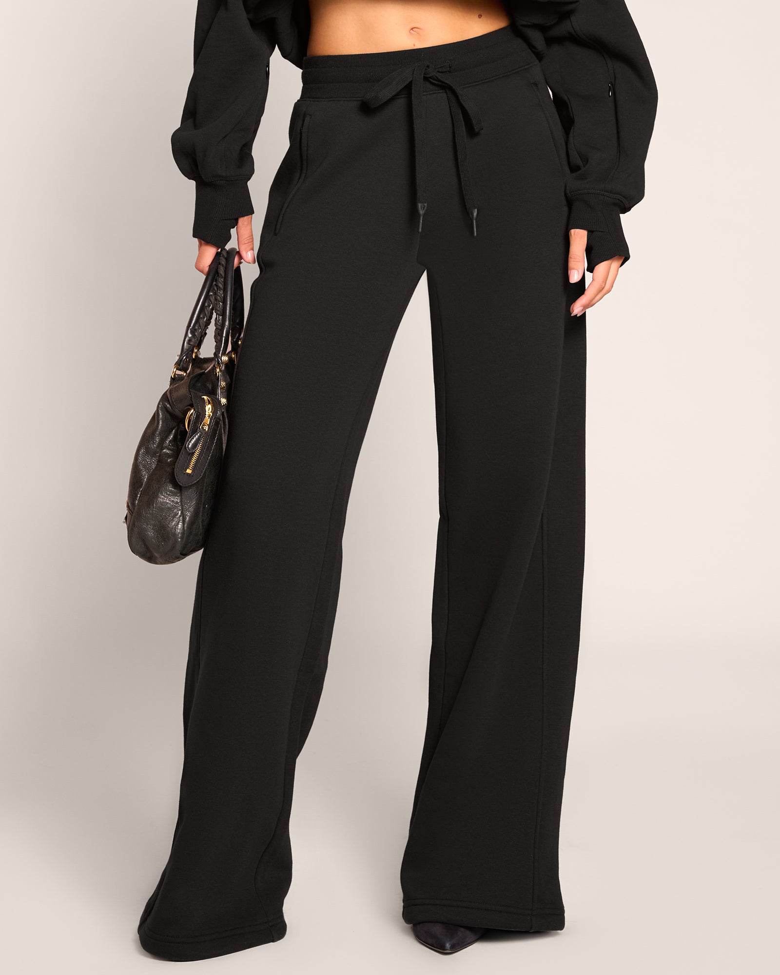 Front close up of model in Fleecey Wide Leg Pull On Pant - Black