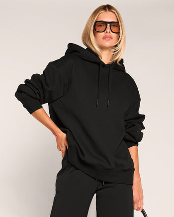 Model wearing Convertible Fleecey - Black as a full length