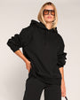 Model wearing Convertible Fleecey - Black as a full length