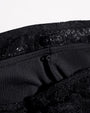 Close up of the under slip detail of Mermaid Maxi Skirty - Lace Black