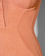 Detail shot of lace and seams on Bombshell - Lace Papaya