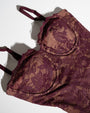 Flat lay close up of Seamed Lushy Midi Dress - Lace Garnet/Tawny