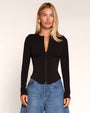 Front view of model wearing Corsety Long Sleeve Top - Black 