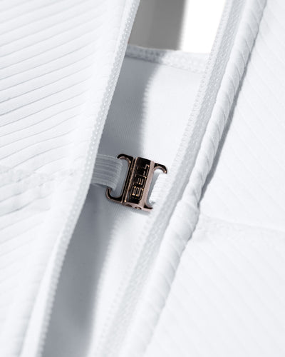 Close up detail of the inside bust clip of Corsety Seamed Rib Tank - Rib White