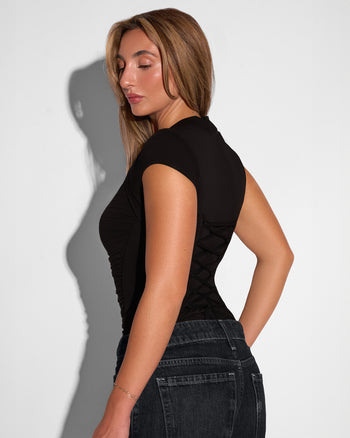 Back view of model in Shapey Ruched Short Sleeve Top - Black
